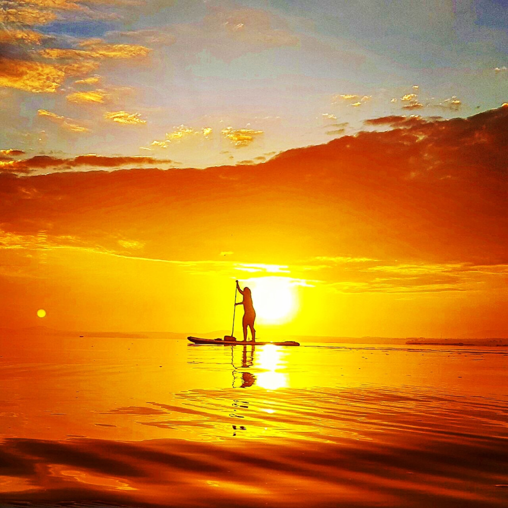 Stand-up Paddling at sunset